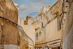 Fes, Morocco. View of the narrow and suggestive alleys in the ancient souk of the medina in Fes in Morocco.