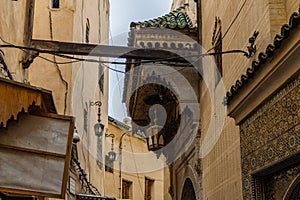 Fes, Morocco. View of the narrow and suggestive alleys in the ancient souk of the medina in Fes in Morocco.