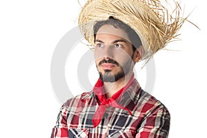 Festa Junina is a brazilian party. Man wearing plaid shirt and s photo