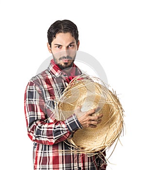 Festa Junina is a brazilian party. Man wearing plaid shirt and s photo