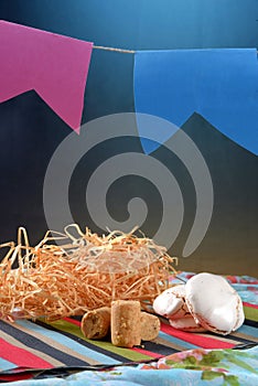 Festa Junina party background with peanuts and traditional sweets. Brazilian summer harvest festival concept. flags and typical photo