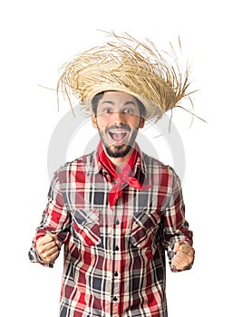 Festa Junina is a brazilian party. Man wearing plaid shirt and s photo