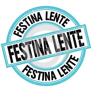 FESTINA LENTE text on blue-black round stamp sign photo