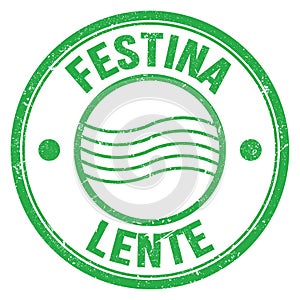 FESTINA LENTE text on green round postal stamp sign photo