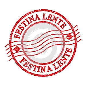 FESTINA LENTE, text written on red postal stamp photo