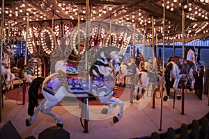 Festival beach boardwalk merry-go-round horseback ride