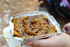 Festival food in hand. India