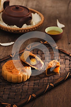 Festival moon cake and hot tea - Chinese cake. Text on cake mean