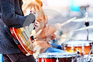 Festival music band. Friends playing on percussion instruments city park.