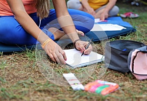 Festival Painting drawing draw process woman draws pen in hands draw on the grass art therapy photo