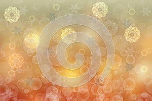 A festive abstract delicate golden gradient yellow orange background texture with glitter defocused sparkle bokeh circles and