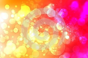 A festive abstract delicate golden yellow red orange gradient background texture with glitter defocused sparkle bokeh circles.