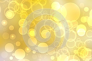 A festive abstract delicate Happy New Year or Christmas background texture with colorful gold yellow pink blurred bokeh lights and