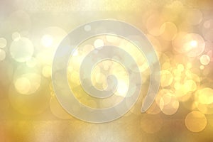 A festive abstract golden yellow gradient background texture with glitter defocused sparkle bokeh circles. Card concept for Happy
