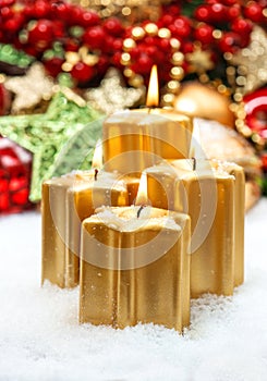 Festive advent decoration with four burning candles