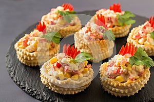 Festive appetizer vol-au-vent with chicken salad, sweet pepper,