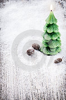 Festive background with Christmas tree candle