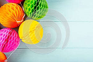 Festive background with colorful paper balls.