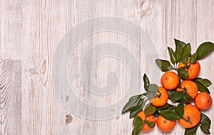 Festive background from mandarins with leaves