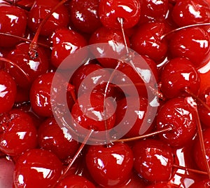 Festive background of red cocktail maraschino cherries