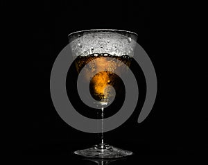 Festive beautiful misted glass with vintage patterns on black background