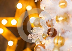 Festive blurred Christmas background with white Christmas tree