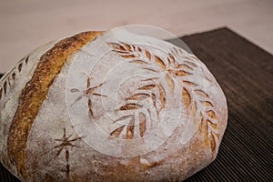 Festive bread with ornamental decorations