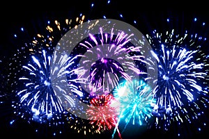 FESTIVE BRIGHT BACKGROUND WITH MULTICOLORED FIREWORKS,FIREWORKS,EXPLOSION OF LIGHT,A DAY OF REST