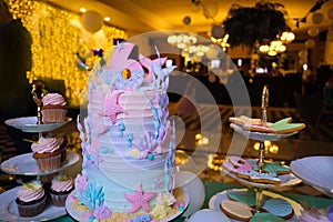 Festive cake with number 6 on banquet table