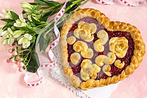 Festive cake in shape of heart for Valentine`s Day