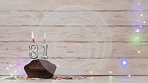 Festive card Happy Birthday with number of burning candles 31