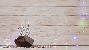 Festive card Happy Birthday with number of burning candles 79