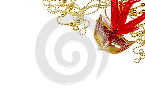 Festive Carnival background with red mask, beads and copy space