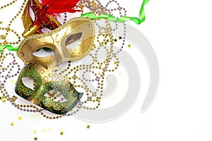 Festive Carnivale mask with beads on a white background. Copy