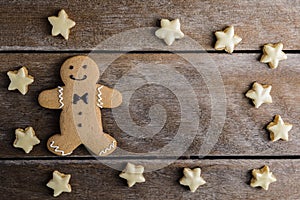 Festive Christmas Cookie and New Year in the shape of Gingerbread man, Snowflake, star on wooden table