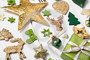 Festive christmas decoration in light green, white and golden co
