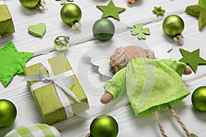 Festive christmas decoration in light green, white and golden co