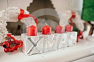 Festive Christmas decoration with red candles