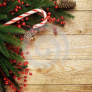 Festive Christmas fir tree on wooden background with space for your text
