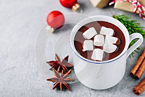 Festive Christmas Hot Chocolate with marshmallow and cinnamon stick