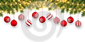 Festive Christmas or New Year Background. Christmas fir-tree branches with light garland and xmas red balls. Holiday`s Background