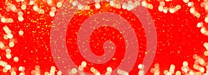 Festive christmas silvester background panorama banner long - Frame made of bokeh lights and golden glitter isolated on red