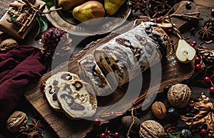 festive christmas tresor rola with nuts, berries and pears on a wooden board