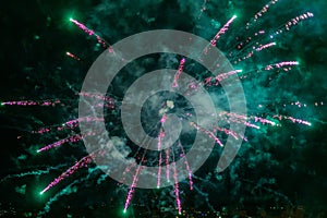Festive colorful fireworks in the night sky, abstract background