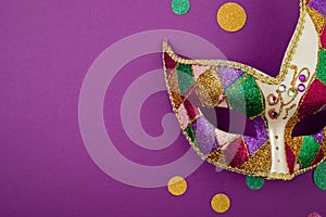 Festive, colorful mardi gras or carnivale mask and accessories. Party invitation, greeting card, venetian carnivale celebration