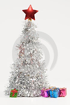 Festive composition with a silver Christmas tree and colorful gift boxes