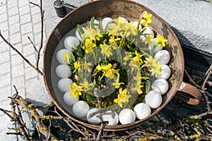 Festive decorations for Easter holiday on the village fountains of the small town of Maienfeld in the Swiss Alps