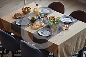 Festive Dinner Table Set with Food