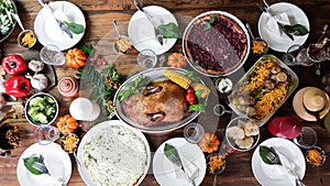 a festive dish with goose for a traditional family dinner in honor of the Thanksgiving holiday. table with pumpkins and