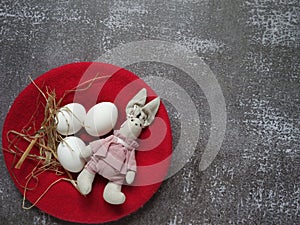 Festive Easter layout of three eggs lay on a colored background